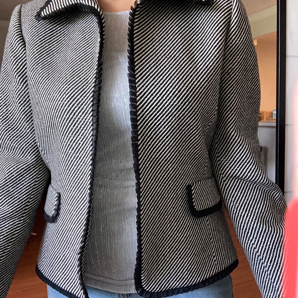 Shiny silver dressy jacket with black lining